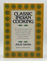Front cover of Classic Indian Cooking cookbook showing title, author, and decorative border.