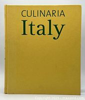 Front cover of the Culinaria Italy cookbook showing yellow cover with green title text.