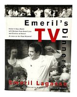 Front cover of 'Emeril's TV Dinners' cookbook showing Emeril Lagasse with raised fists and series of cooking images on top.