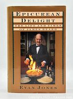 Front cover of the book with dust jacket showing James Beard flambéing food.