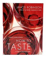 Front cover of the wine tasting book showing red and white wine glasses with title and author clearly visible.