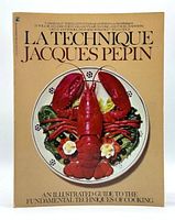 Front cover of the softcover book 'La Technique' by Jacques Pepin, showing a cooked lobster on a decorative plate and title text.