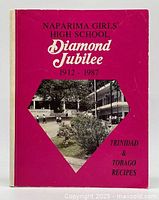 Front cover of the softcover cookbook titled Naparima Girls High School Diamond Jubilee 1912-1987 with a photo of the school building and grounds in black and white on a red background.