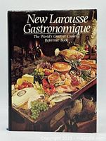 Front cover image of the book showing food spread illustration with title text overlay.