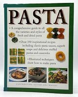 Front cover of hardcover cookbook titled 'Pasta' showing various pasta shapes and recipe highlights.