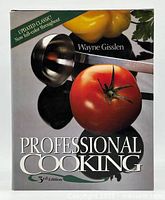 Front cover of the 'Professional Cooking' 3rd Edition by Wayne Gisslen showing a tomato, yellow bell pepper, and kitchen utensils.