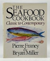 Front cover of the cookbook showing title, authors, and fish artwork.