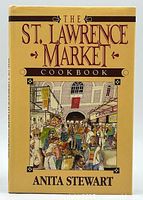Front cover of The St. Lawrence Market Cookbook with illustrated market scene and title text by Anita Stewart.