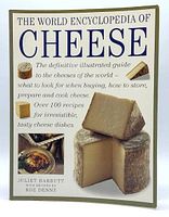 Front cover of the book The World Encyclopedia of Cheese showing title, subtitle, authors, and images of cheeses