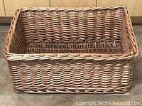 angled view of entire rectangular wicker basket