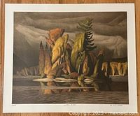 Full view of unframed print on wood floor showing complete artwork and borders