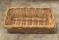 Top view of rectangular wicker basket interior and weave pattern