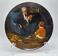 Front of Norman Rockwell plate on stand