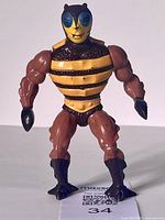 Front view of Buzz-Off figure showing body detail, paint, and condition