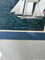 Close-up of print showing sailing ship and artist's signature Charles Wysocki in lower left.