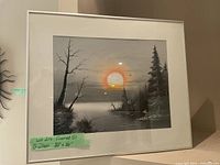 Front view of framed oil painting by G. Wilson showing the full artwork and frame with label.