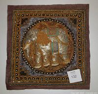 Full square view of the fabric wall hanging with elephant motif and detailed embroidery and beading.