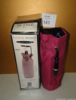 Photo showing the boxed product labeled 'Cool Wine' Insulated Wine Bag and the maroon insulated bag with attached corkscrew.