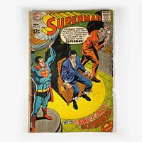 Front cover of the 1968 DC Superman v1 #211 comic book with protagonist Superman in a cage and other characters in a cell.