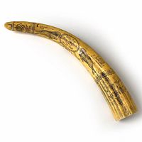Curved resin tusk with detailed black scrimshaw-style engravings showing whaling scenes and inscriptions on ivory toned surface
