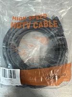 Front view of the high speed HDTV cable in sealed packaging showing text and icons for supported connection types