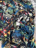 Close-up of floral pattern fabric of the long summer dress.