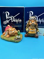 Both Douglas and Alfie PenDelfin rabbit figures with their original boxes