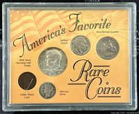 Front side of coin set display showing 5 US coins (Indian Head Cent, Kennedy Half Dollar, Buffalo Nickel, Mercury Dime, Bicentennial Quarter) with yellow card background