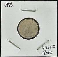 Obverse side of 1958 Canadian silver 10 cents coin showing sailing ship design and year 1958 with note indicating 80% silver content.