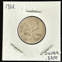 Reverse side of 1962 Canadian silver 25 cents coin featuring Caribou design.
