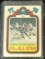 Front side of the hockey card showing Darryl Sittler in action, labeled 2nd Team All Star Center, card #331, 1977-78 season.
