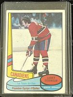 Front side of 1980-81 O-Pee-Chee hockey card showing Larry Robinson in Montreal Canadiens uniform, card #84.