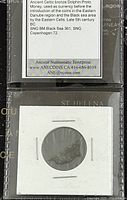 Detailed view of the coin with informational card describing historical use and region