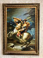 Full view of the framed Napoleon painting showing the horse rearing with dramatic sky