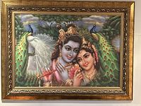 Frontal view of Radha Krishna painting showing detailed depiction of figures and background with peacocks, vibrant colors.