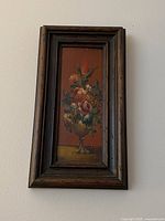 Front view of the antique Victorian floral still life oil painting in wooden frame showing detailed floral bouquet and aged frame.