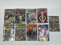 Photo showing 7 Mars Attacks comics fanned out, illustrating cover art and condition of each comic book.