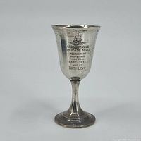 Front view of chalice showing engraving and club logo