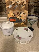Full view of all items including cocktail glass, appetizer plates, Crock-Pot Little Dipper, and Acacia wood cheese board with spreaders.