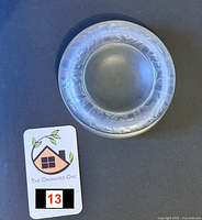 Top view showing round ashtray with frosted archers band around the rim and clear central section.