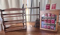 Wooden and glass spice cabinet and two wooden racks, one labeled 'SPICES'