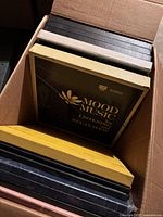 Box containing 12 vinyl box collections; visible front cover is "Mood Music Listening and Relaxation" with various solid color box sets