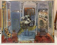 Front view of the framed poster showing the painting with two open windows and interior furniture in bright colors.