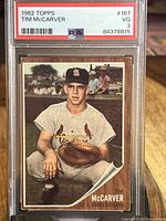Front view of the 1962 Topps Tim McCarver rookie card graded PSA 3 with Tim McCarver in a catcher's stance in St. Louis Cardinals uniform.