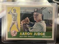 Front of the card displaying Aaron Judge in Yankees pinstriped uniform, horizontal layout with team logo and RC icon
