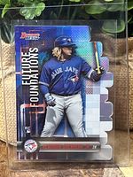 Front view of 2019 Bowman’s Best Vladimir Guerrero Jr. Die Cut Rookie Refractor baseball card featuring 'Future Foundations' design and player image.