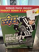 Front of sealed box showing 'Upper Deck 2021-22 Hockey Series Two' and Young Guns Rookie Cards promotion