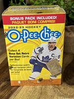 Front view of the sealed yellow O-Pee-Chee box with Toronto Maple Leafs player and bonus pack note.