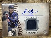 Front of the baseball card showing Jose Berrios in pitching pose, autograph on upper right, and navy blue jersey patch embedded below.