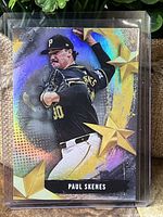 Front side of Paul Skenes Topps MLB Stars Foil SP insert baseball card in protective sleeve showing player image and design.